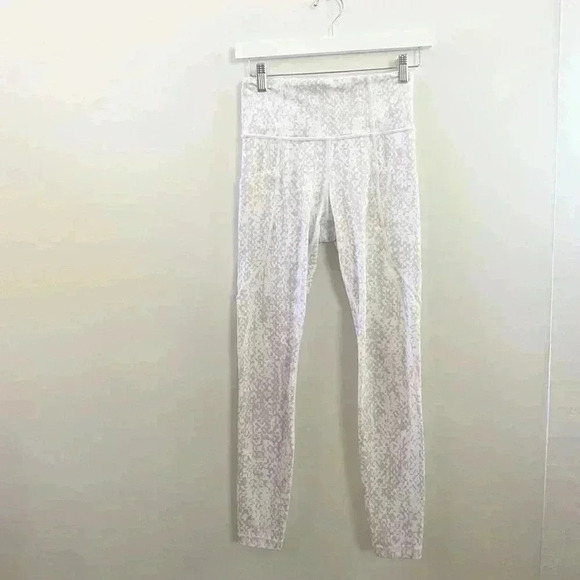 Athleta Pants - Athleta salutation stash snakeskin print leggings